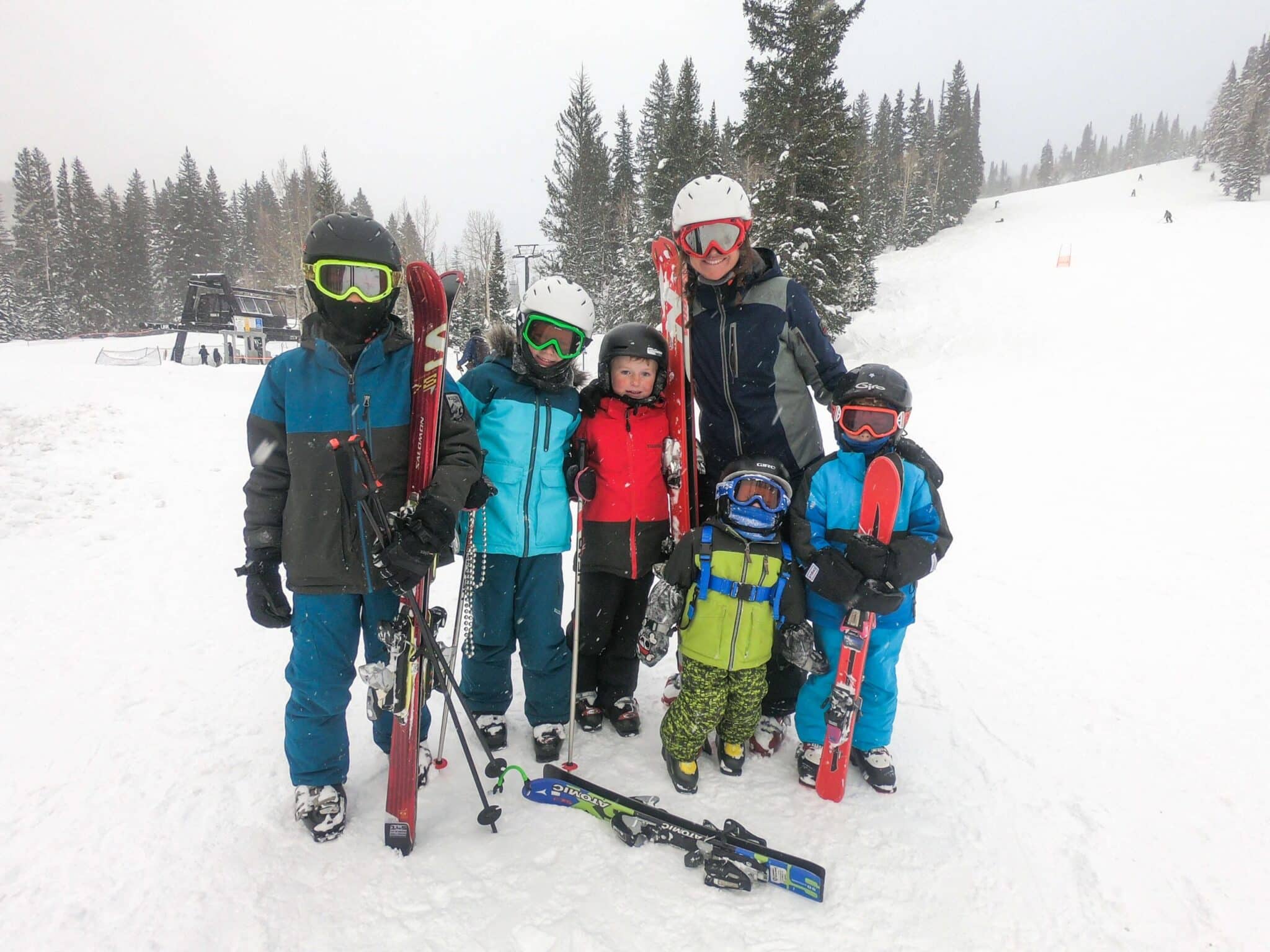 Family putting on skis Family putting on skis